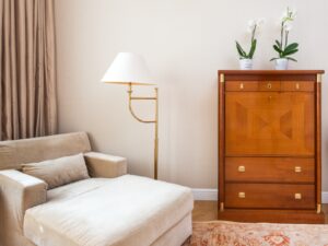 cozy and luxury room with armchair and cabinet