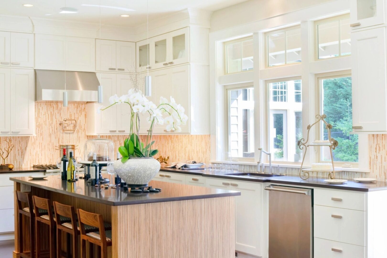 An elegant kitchen with white finish on cabinets